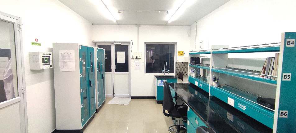 Laboratory bench with microscope and workstation